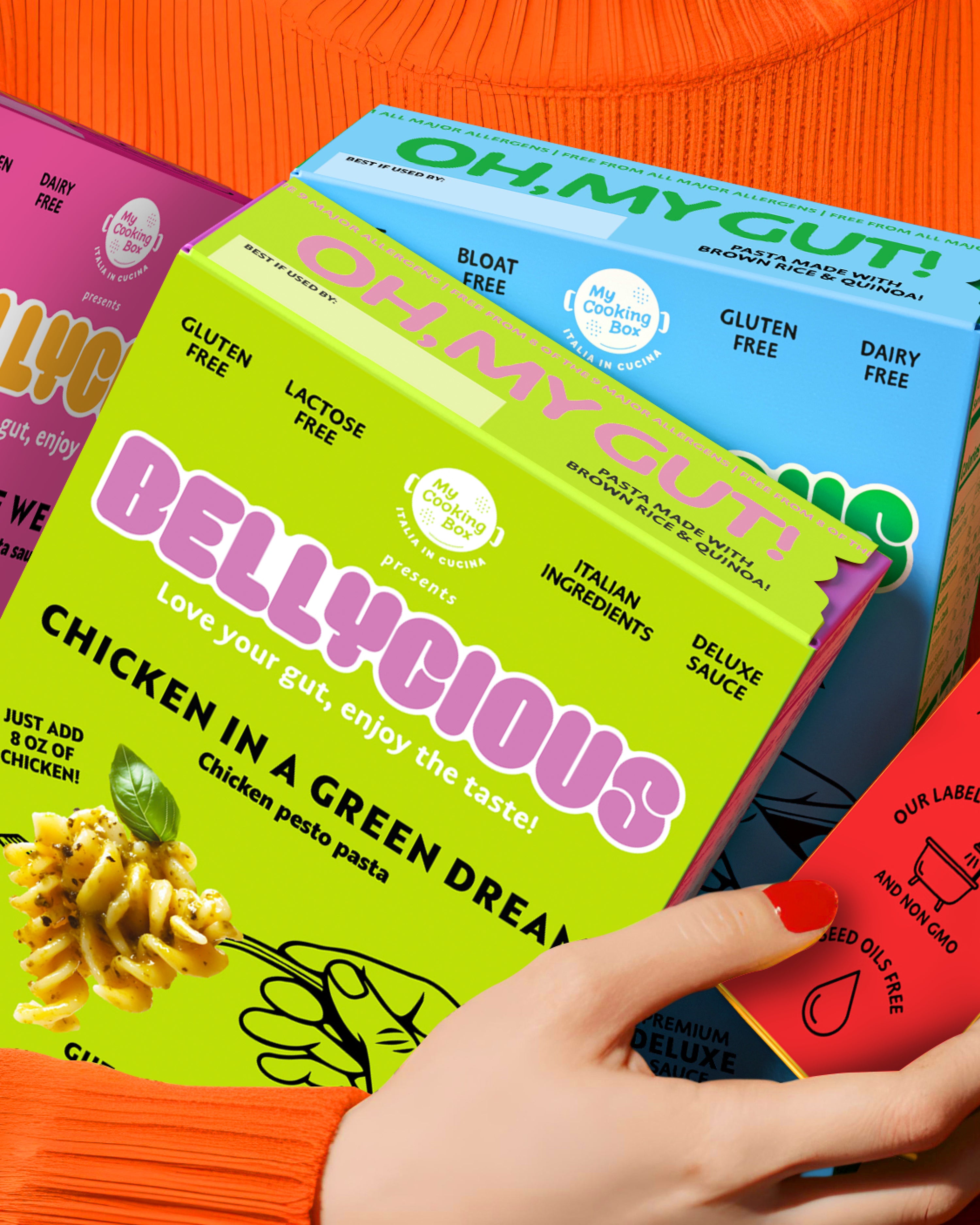 Hand holding a Bellycioust pasta with colorful packaging.